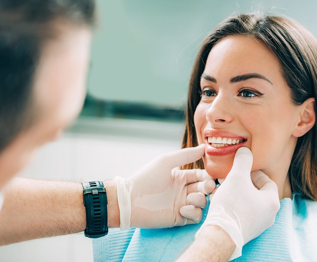 Woman getting comprehensive dental care in El Paso, TX