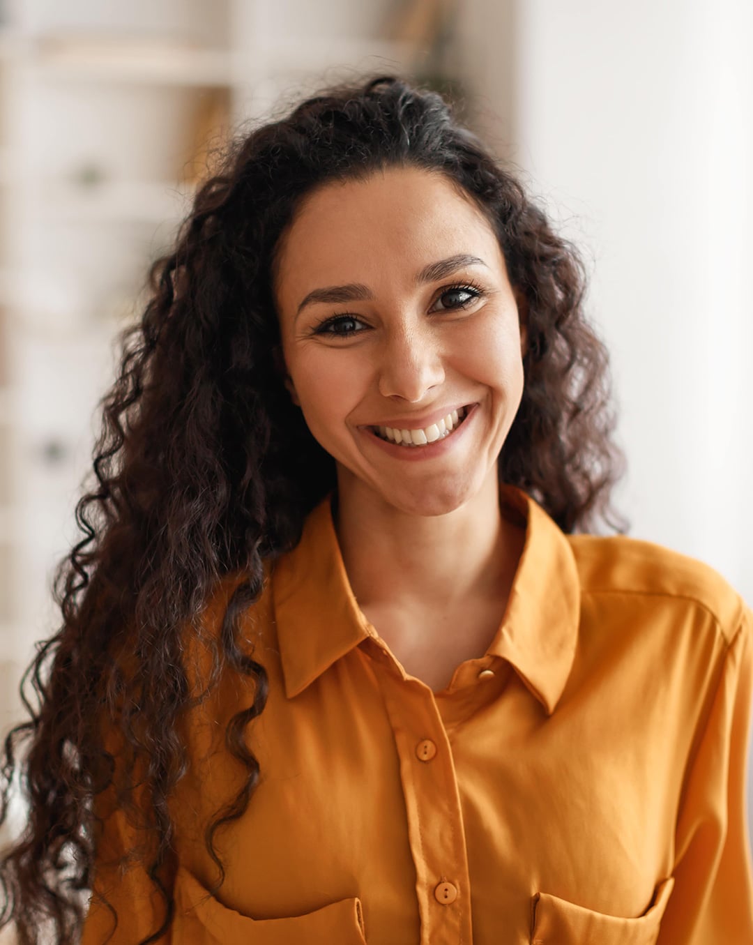 Woman smiling after a dental consultation in El Paso, TX