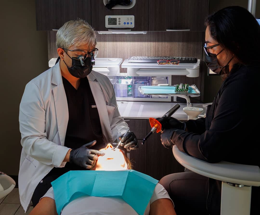 Woman getting comprehensive dental care in El Paso, TX